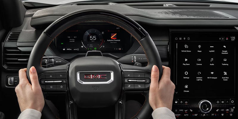 15-inch GMC Premium Infotainment System and digital driver display in the 2026 GMC Acadia