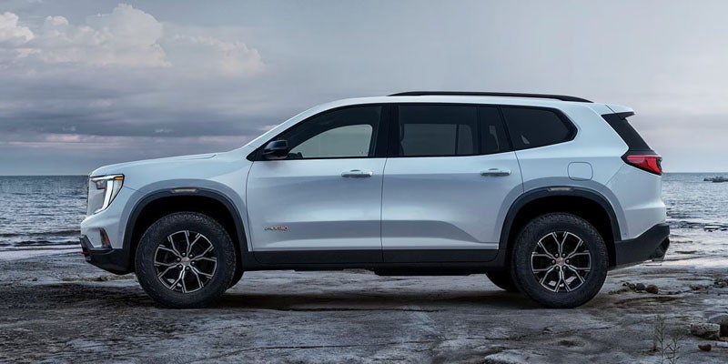 Side profile of the 2026 GMC Acadia showcasing available trim levels and bold SUV styling