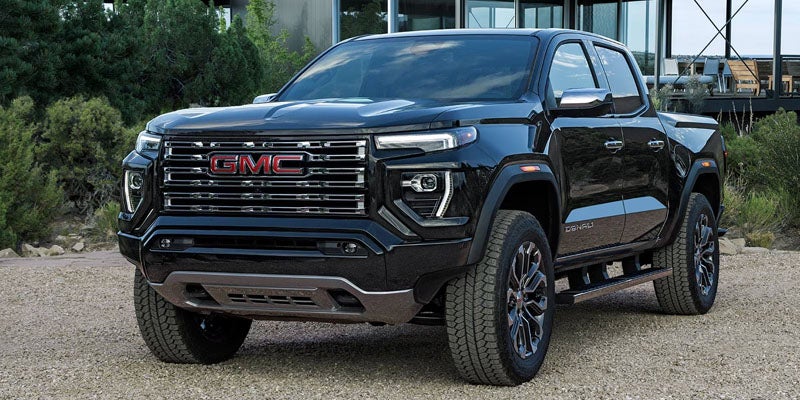2026 GMC Canyon parked outdoors highlighting its bold exterior styling and capability
