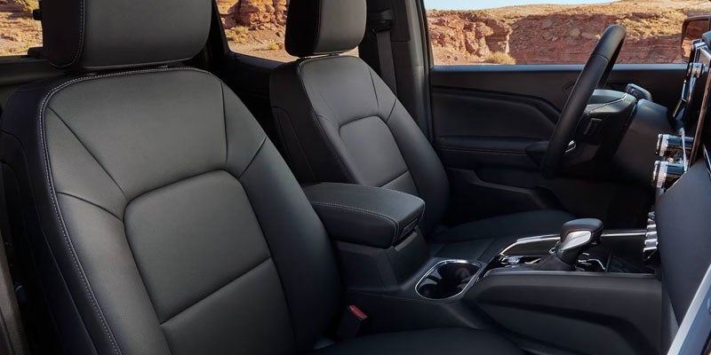 Premium front cabin of the 2026 GMC Canyon featuring advanced safety and driver-focused controls