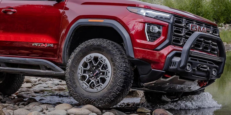 Front wheel and rugged exterior detail of the 2026 GMC Canyon highlighting its off-road capability
