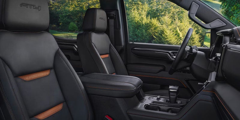Premium interior of the 2026 GMC Sierra 1500 featuring leather seating, modern dashboard, and spacious cabin